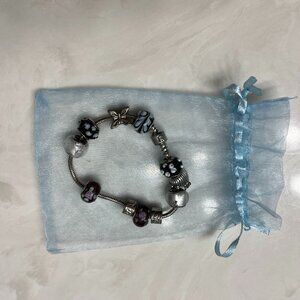 Silver and Black Charm Bracelet with Baubles